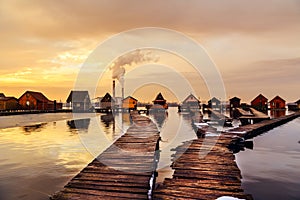 Sunset lake Bokod with pier