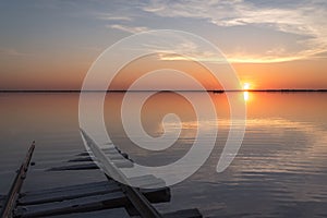 Sunset lake clouds rails reflection salt horizon