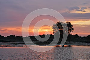 Sunset at Lake.Evening light with river life.Beautiful sunset view.Summer time