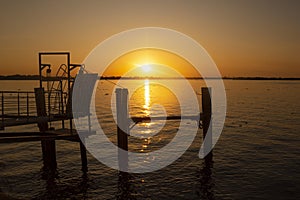 sunset on the lake Guaiba located in Porto Alegre, Rio Grande do Sul, Brazil