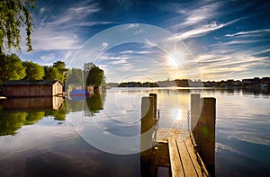 Sunset on the lake with jetty in Malchow Mecklenburg-Vorpommern / Germany