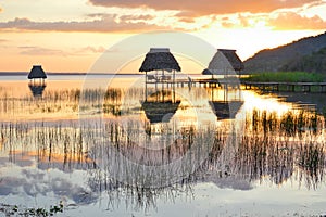 Sunset at the lake Peten Itza in El Ramate, Guatemala photo