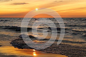 Sunset at Lake with Sand Reflection