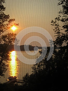 Sunset on Lake through Screen Door