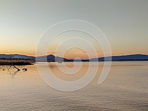 sunset on the lake. Serra da Mesa lake landscape with fishermen in the background and sunset in the mountains. nature scenery.