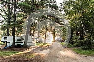 Sunset at Lake of two rivers Campground Algonquin National Park Beautiful natural forest Canada Parked RV camper