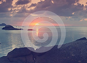 Sunset landscape with sea gangway stones