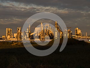 Sunset light on industrie plant photo