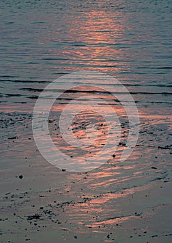 Sunset light reflected on beach