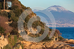 Sunset light on tufaceous slope with Vesuvius mount