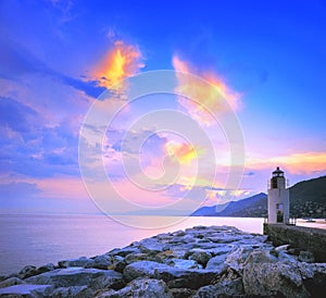 Sunset Lighthouse in Camogli port photo