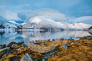 Sunset lights in a fjord near tromso