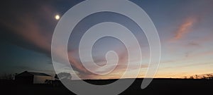 Sunset lights up the night aky