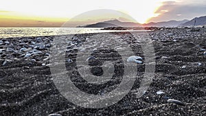 Sunset on ligurian beach