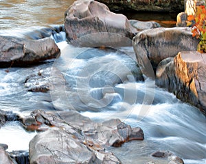 Sunset lit boulders of the Castor River