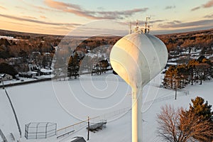 Sunset Lit Water Tower Over Ballpark Winter