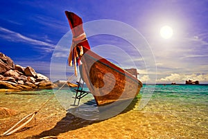 Sunset with Longtail Boat photo