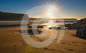 Sunset at Los Locos Beach, in the town of Suances in Cantabria (Spain). Cantabrian Coast photo