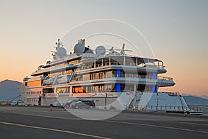 Sunset: Luxury large super or mega motor yacht in the evening.