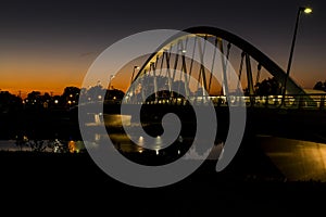 Sunset at Main Street Tied Arch Suspension Bridge over Scioto River in Columbus, Ohio