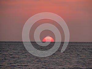 Sunset on Maldives, Indian Ocean, luxury resort Island. Beautiful sunset landscape and colorful sky.