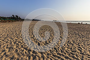 Sunset on Mandrem beach in Goa, India