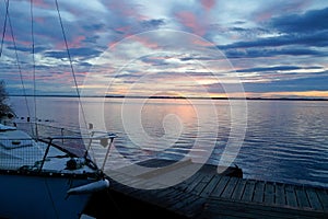 Sunset marina boats in blue water lake of biscarrosse landes france photo