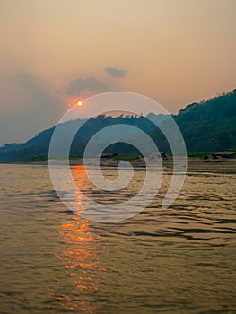 Sunset on the Mekong River. Luang Phabang, Laos, Asia