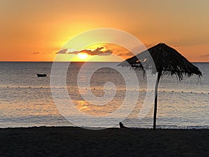 Sunset at Mero Beach in Dominica Island photo