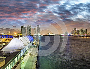 Sunset in Miami Port, Florida. View of the city from departing cruise ship