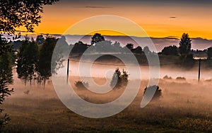 Sunset and mist in a countryside