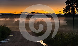 Sunset and mist in a countryside
