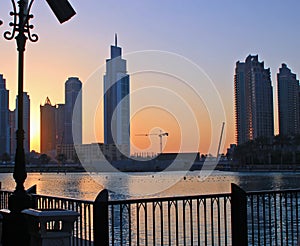 Sunset through modern buildings