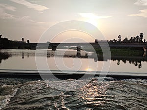 sunset at the moment bridge waters