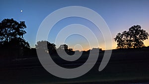 Sunset and the Moon in Springfield Tennessee in the Summer