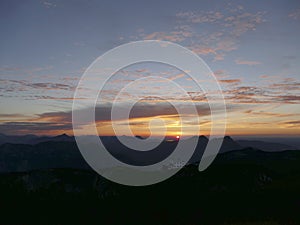 Sunset mountain panorama with accommodation Stoerhaus at Untersberg mountain, Bavaria