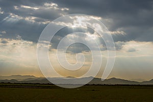 Sunset mountain range beautiful landscape mist, dusk golden time dramatic sky. Beautiful landscape high mountain ridge mist