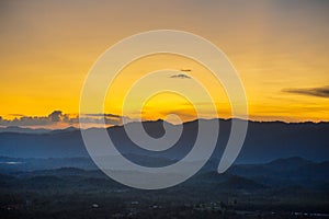 Sunset mountain range beautiful landscape mist, dusk golden time dramatic sky. Beautiful landscape high mountain ridge mist