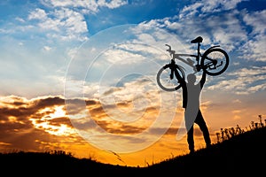 Sunset in the mountains with mountain biking winner delight