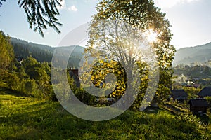 Sunset in the mountains village. Carpathians