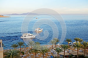 Sunset at Naama Bay, Red Sea and motor yachts