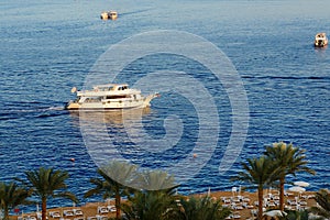 Sunset at Naama Bay, Red Sea and motor yachts