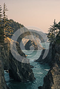 Sunset on natural bridges along the west coast of the Pacific Ocean, Oregon