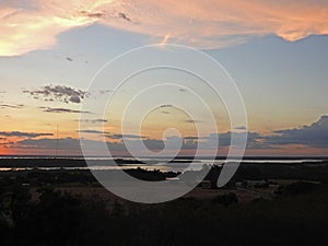 Sunset near the artificial lake of Itaipu photo