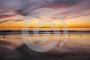 Sunset at Newport beach California with santa Catalina island in background