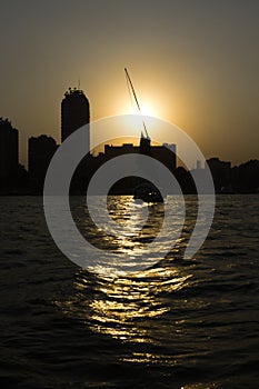 Sunset on the Nile with a boat in Cairo