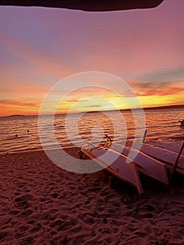 Sunset at Nirwana beach and boat