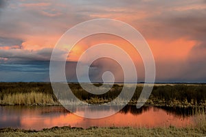 Sunset observing and coluds over lake