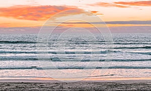 Sunset on the ocean beach in San Francisco: beautiful landscape, concept of vacation, travel, relaxation