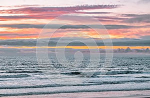 Sunset on the ocean beach in San Francisco: beautiful landscape, concept of vacation, travel, relaxation